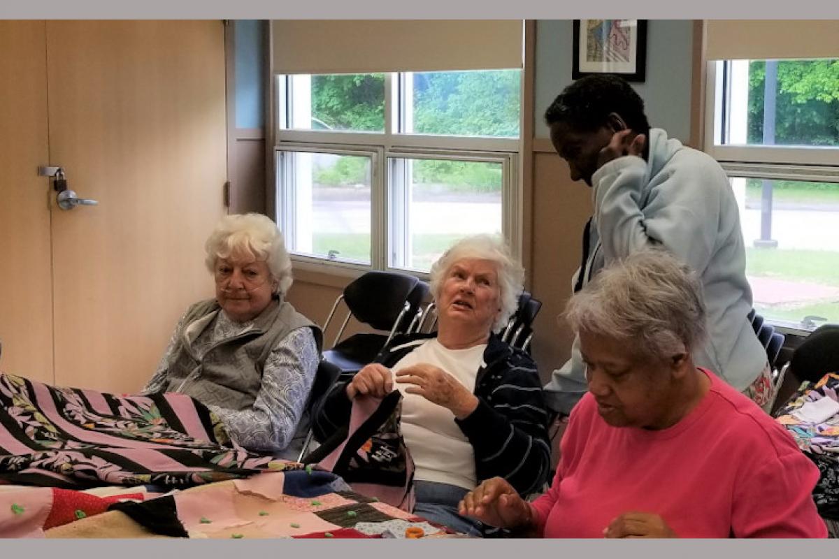 Women Quilting and Knitting 1