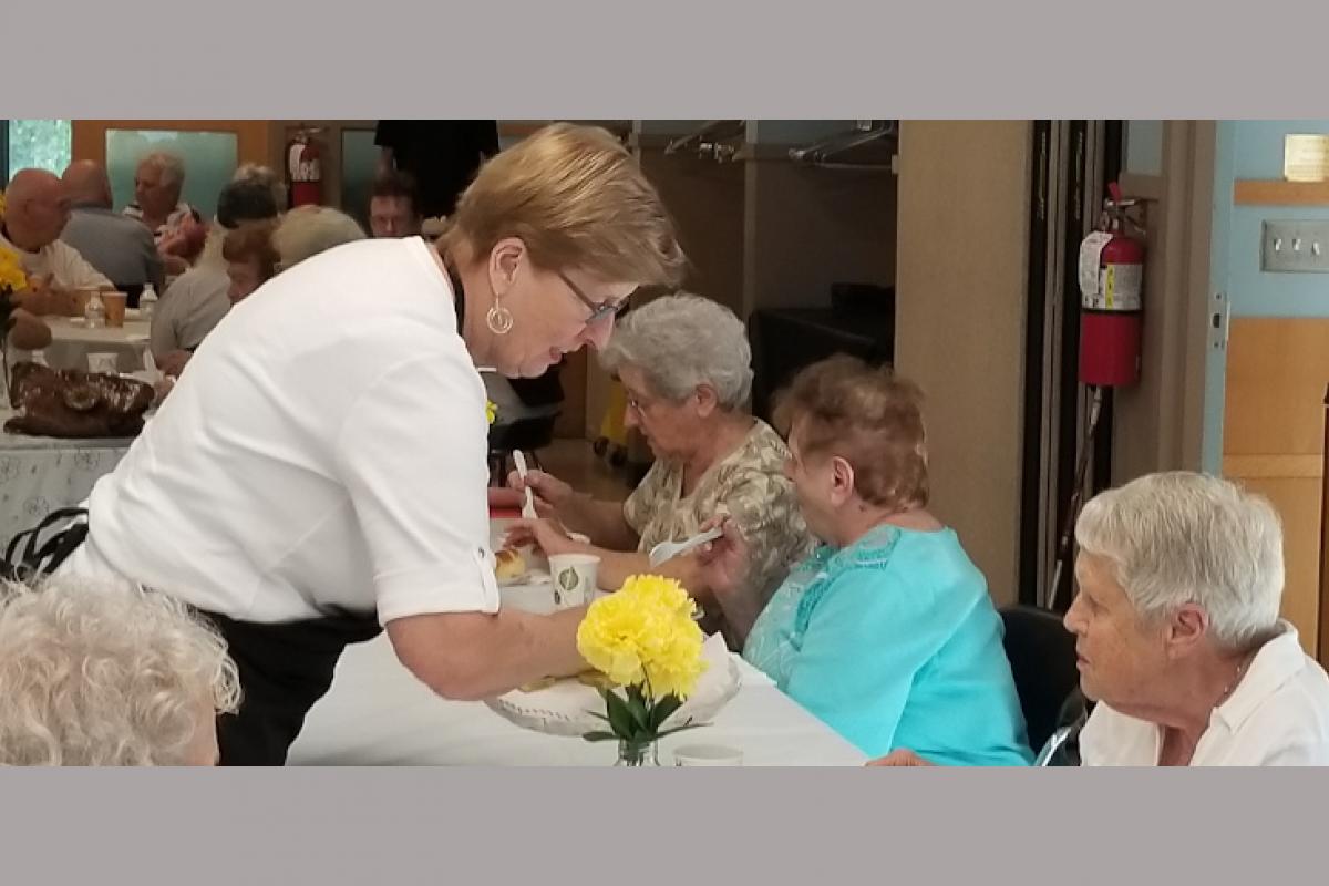 Staff Serving Guests