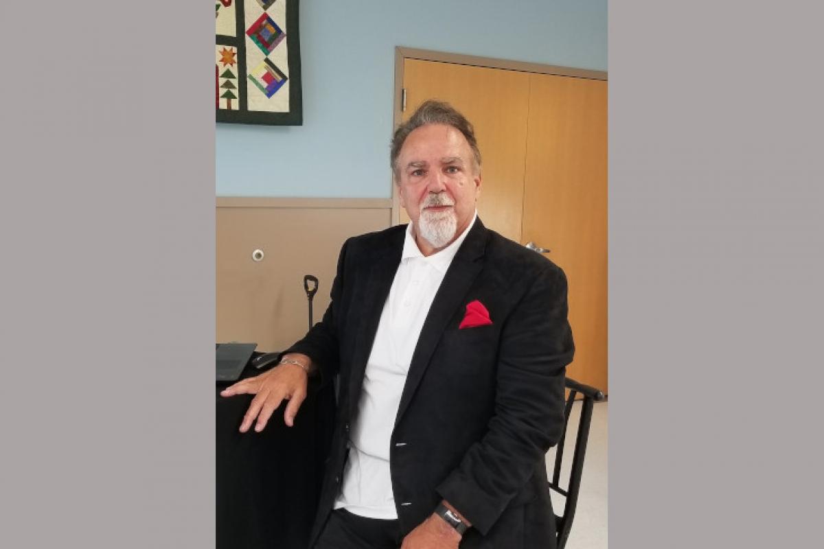 Man in Black and White Suit