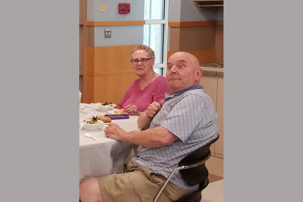 People Seated at Table Eating 8