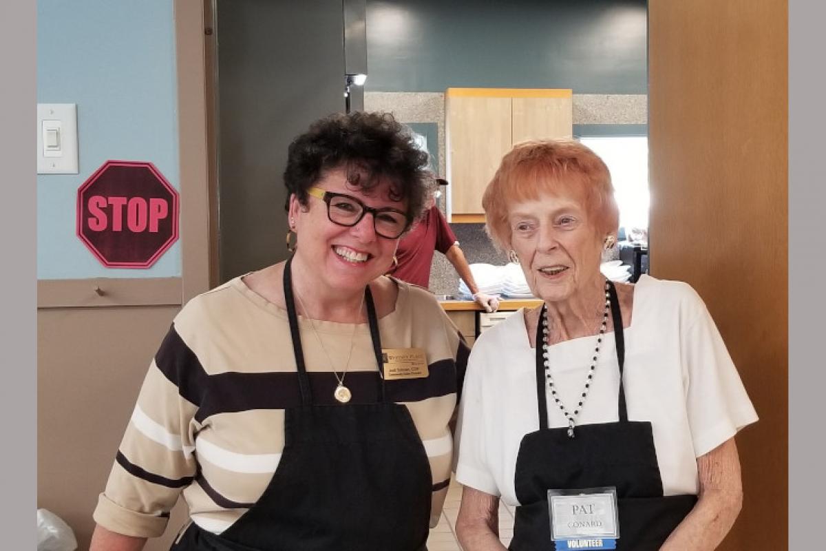 Staff Members Serving Guests 2