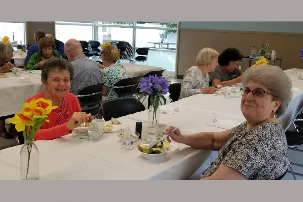 People Seated at Table Eating 5