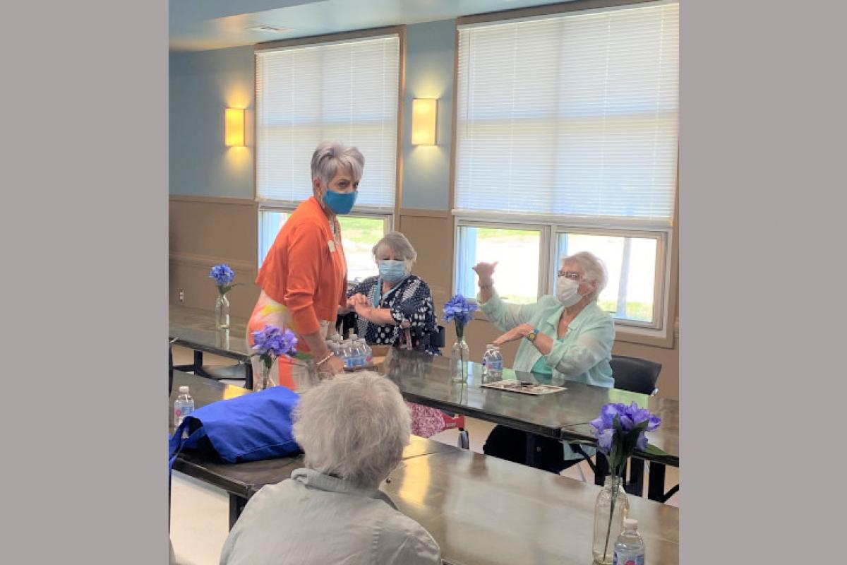 Staff Talking with Guests 2