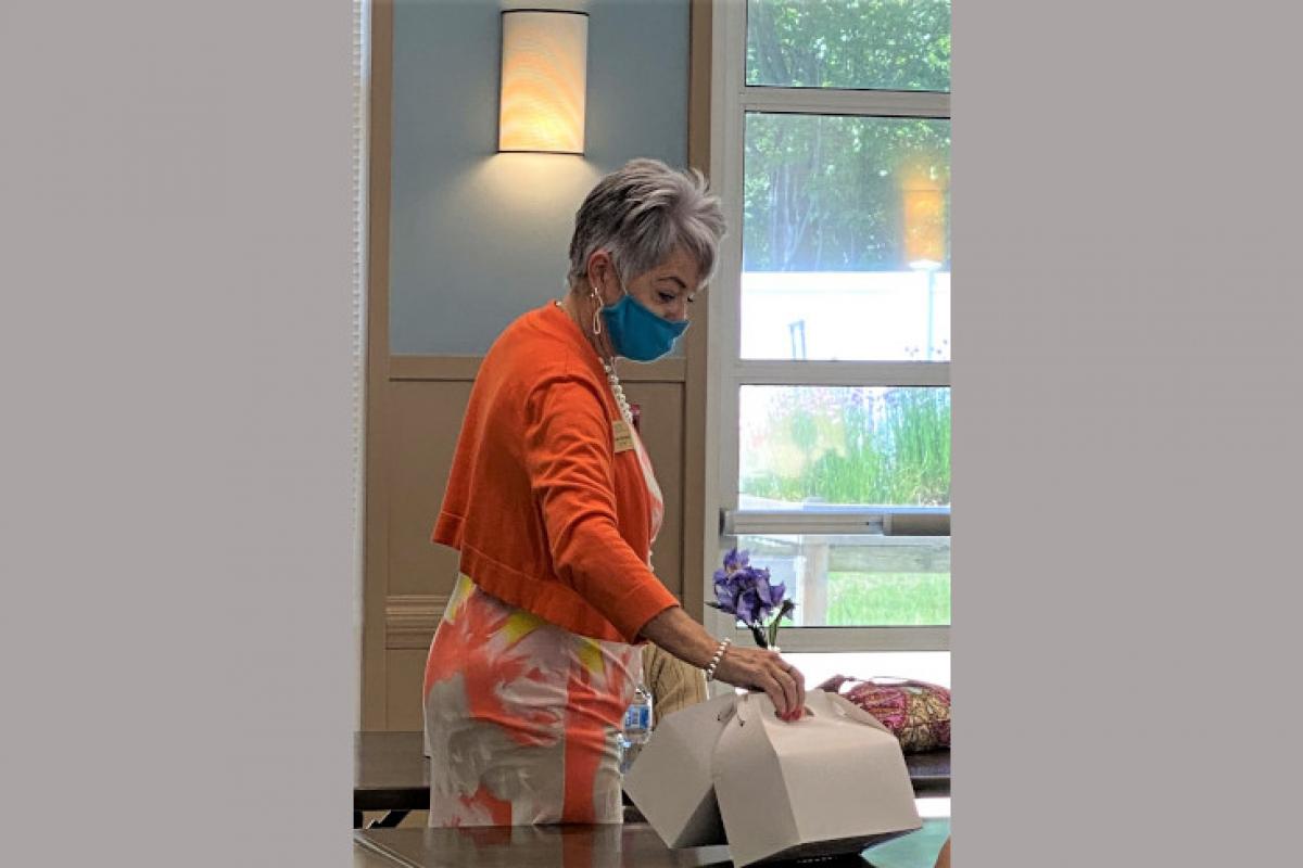 Person Serving Packaged Meals