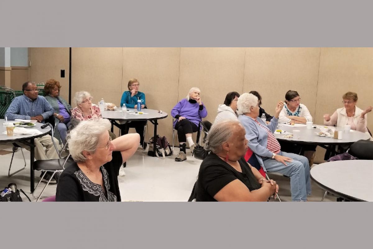 People Seated at Several Tables