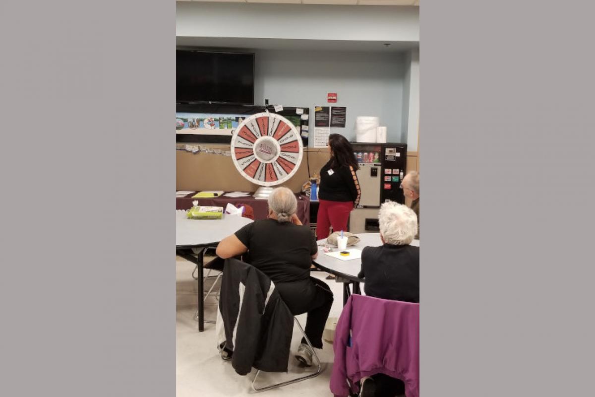 Person Hosting Wheel of Fortune Game 2