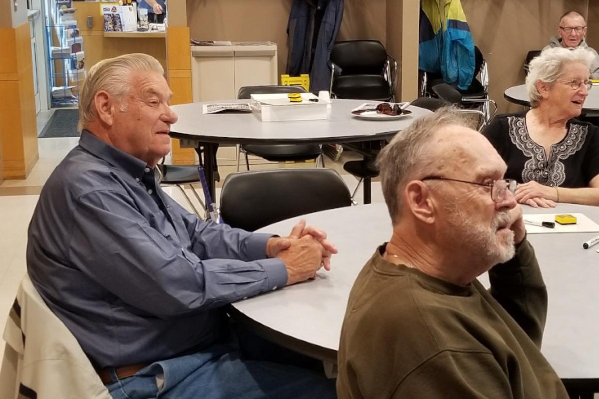 People Seated at Table 1