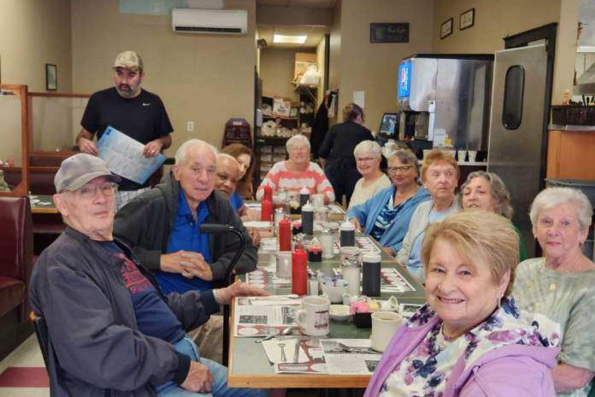 Seniors Enjoying Breakfast at a Diner 5