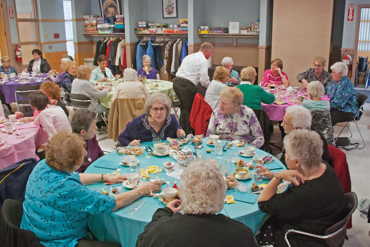 Tea Party Spanning Across Several Tables