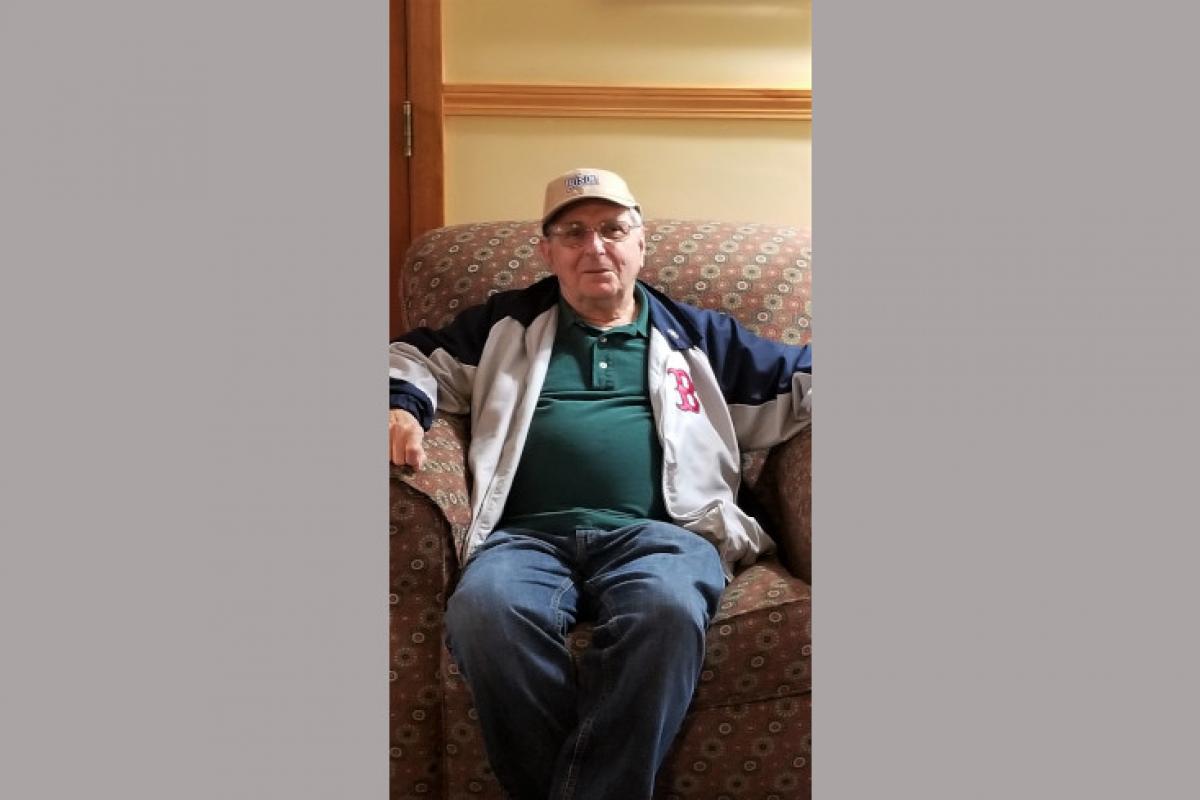 Man Sitting in Chair