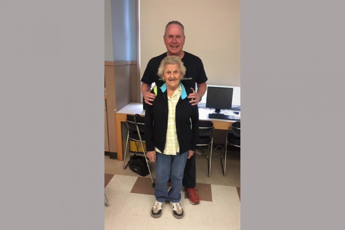 Instructor Posing with Class Member