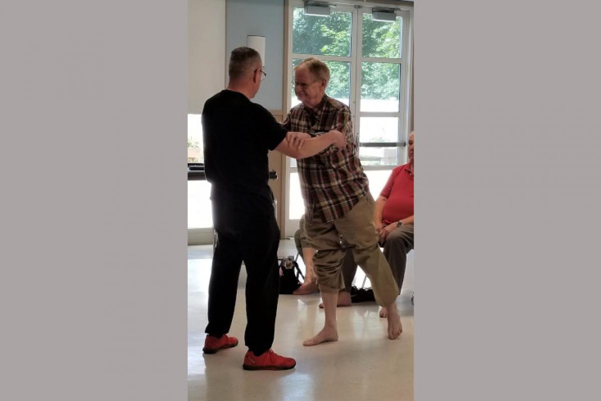 Instructor Supporting Senior 6