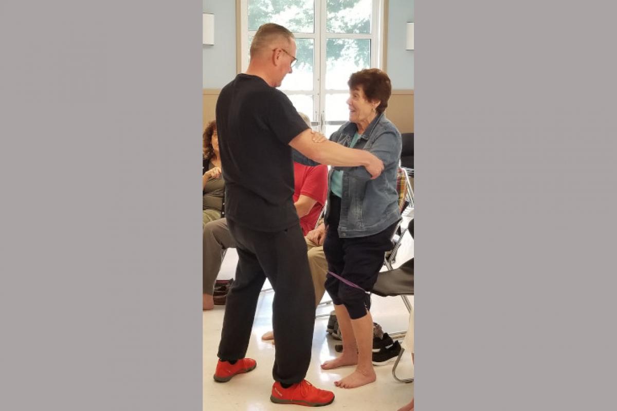 Instructor Supporting Senior 1