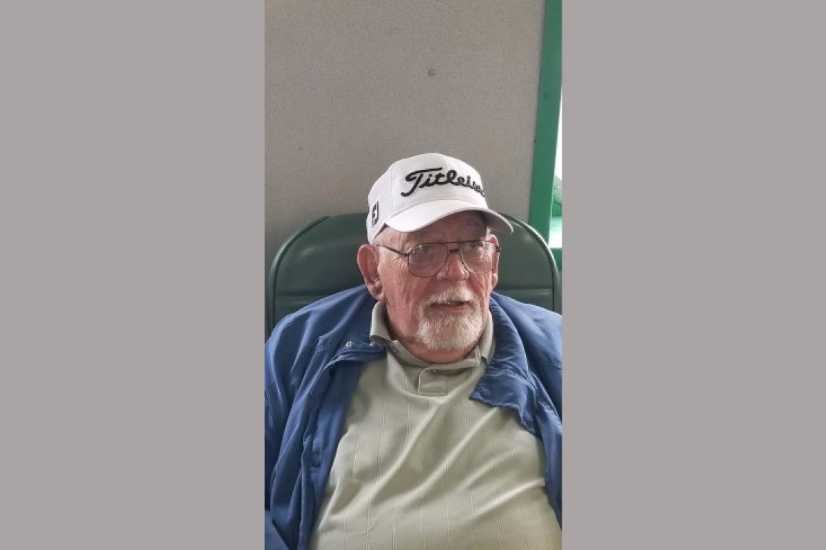 Man Sitting in Chair