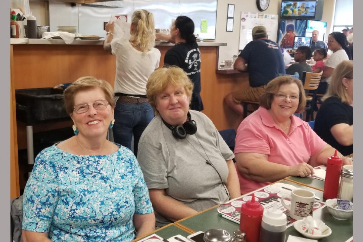 Seniors Enjoying Breakfast at a Diner 09