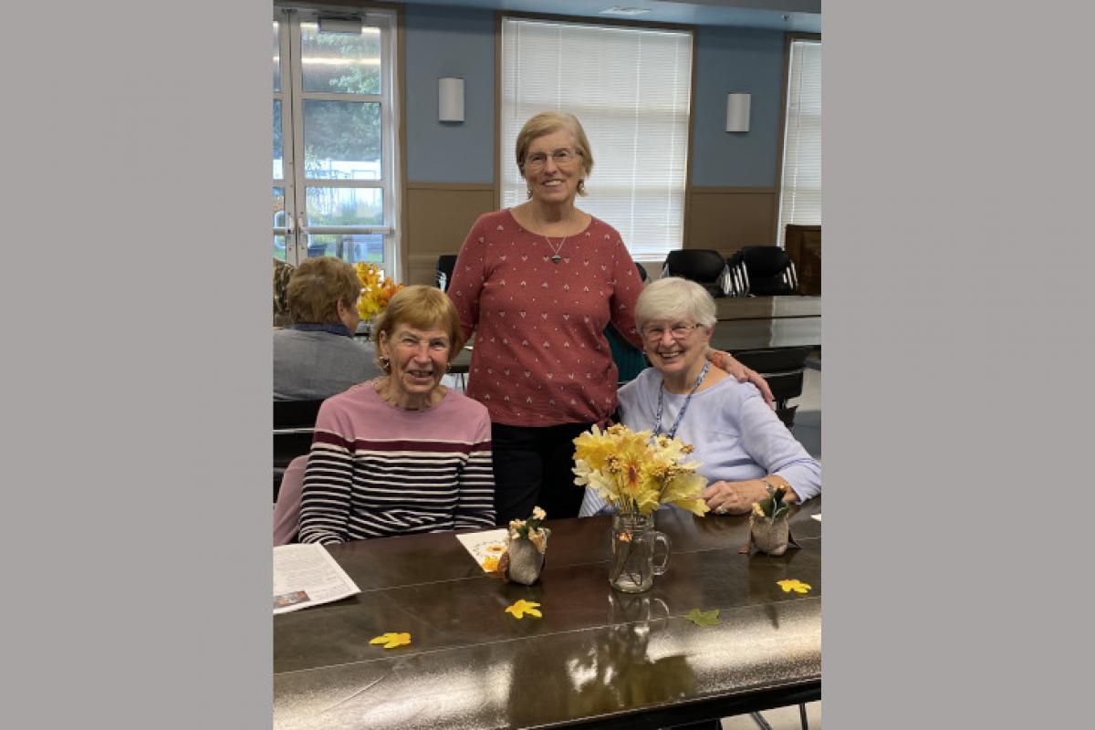 Three Women Pose for Photo