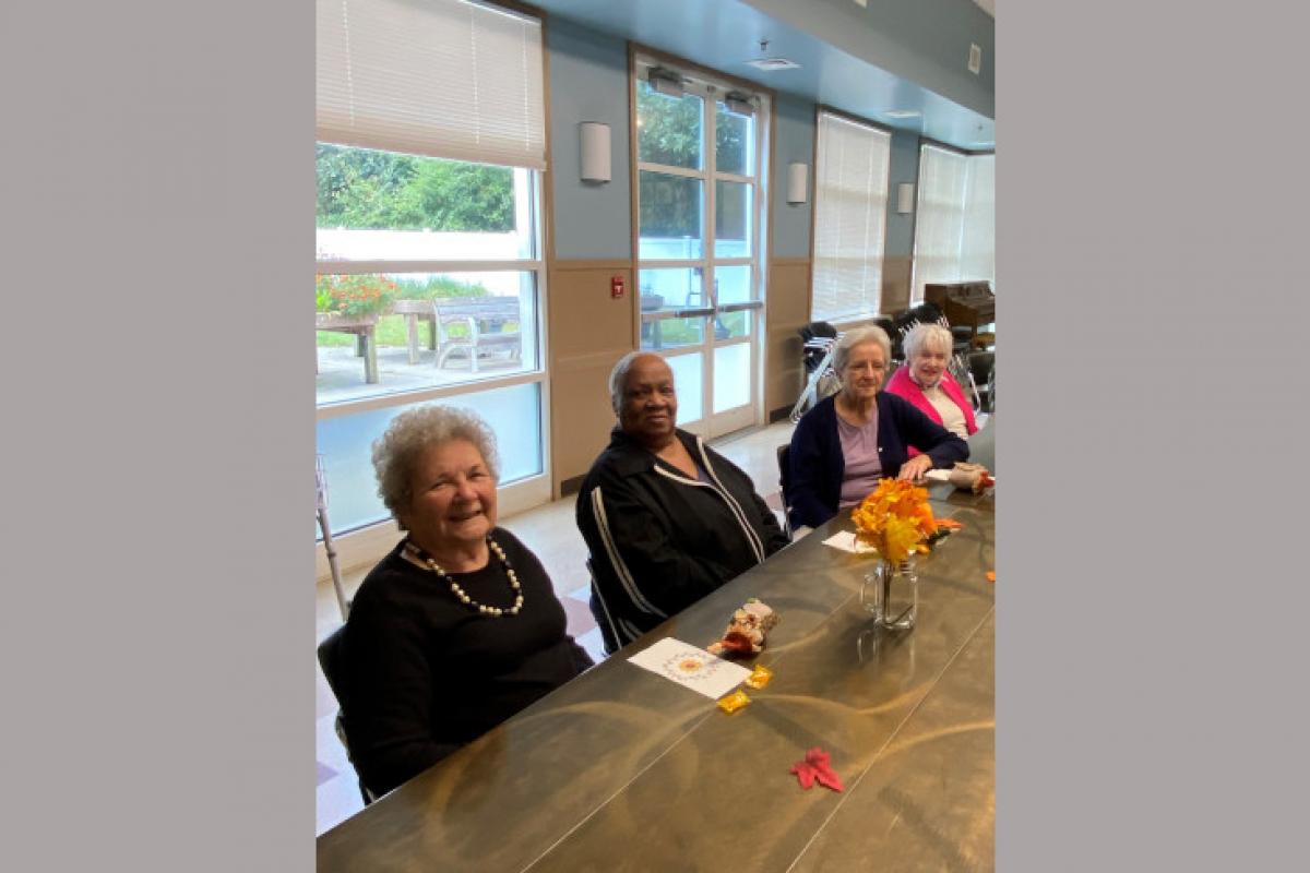 Women Gathered at Table