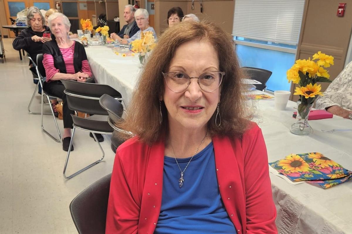 Woman Smiling for Photo