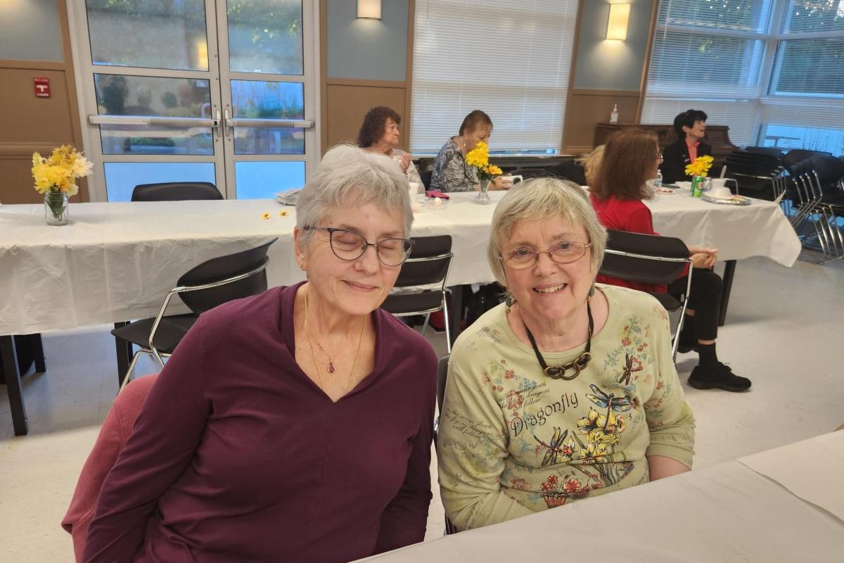Two Women Smiling for Photo