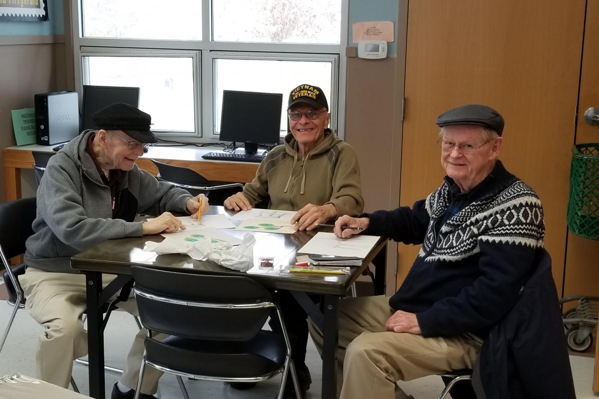 Three Men at Table Drawing