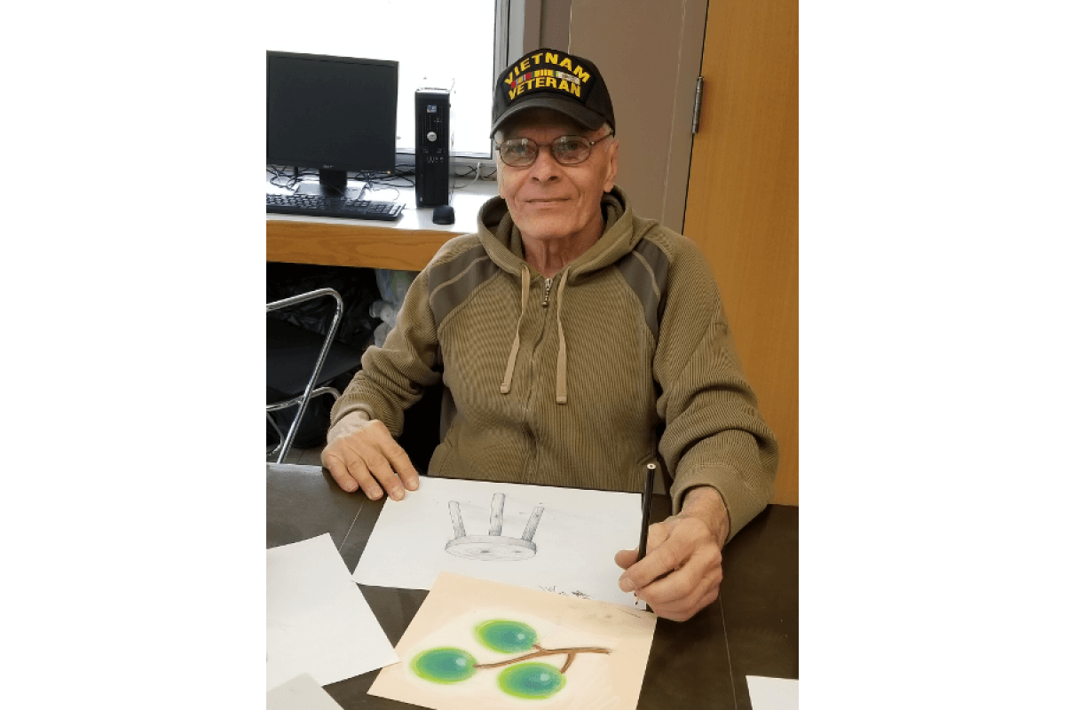 Man Drawing a Picture of Stool