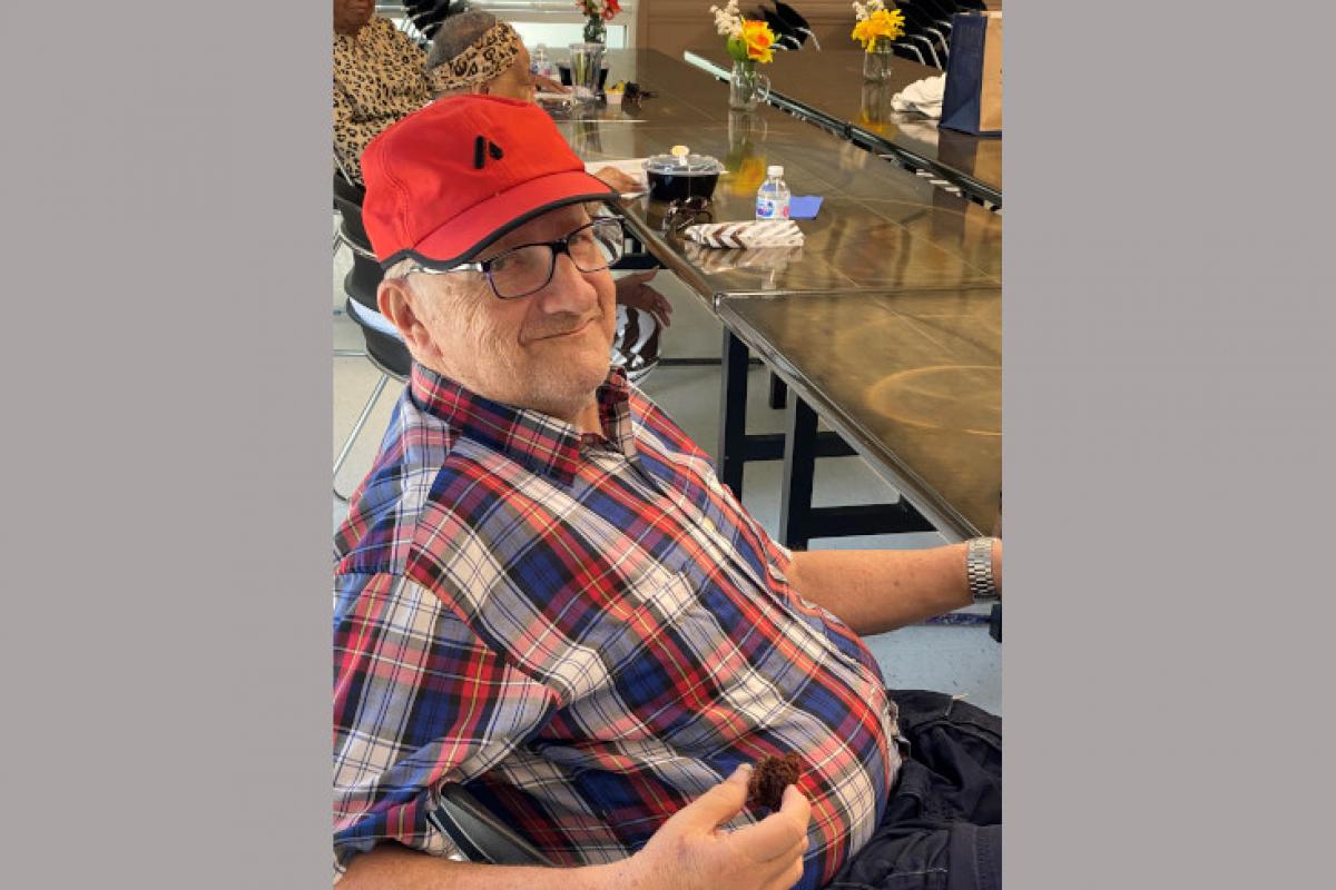 Man Leaning Back in His Chair