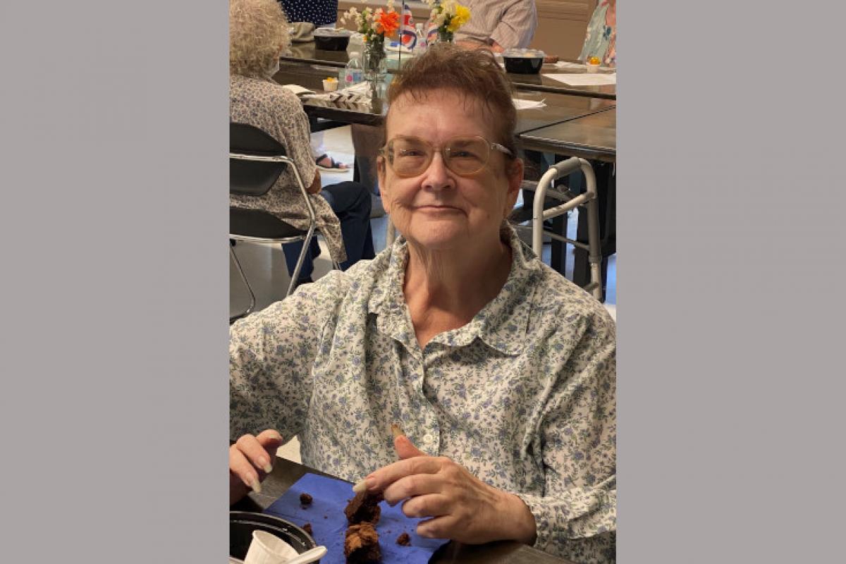Woman Eating Brownie