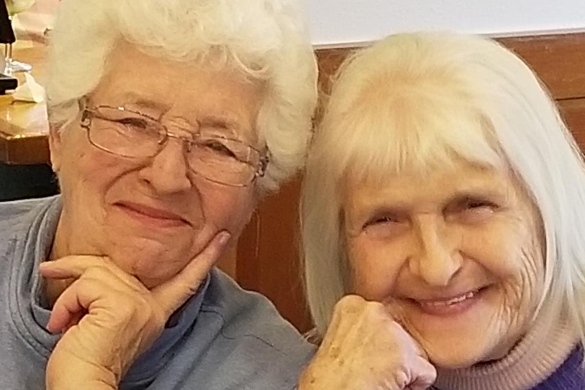 Two Women Smiling for Photo