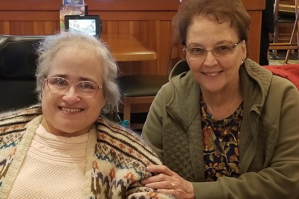 Two Women Seated at Olive Garden