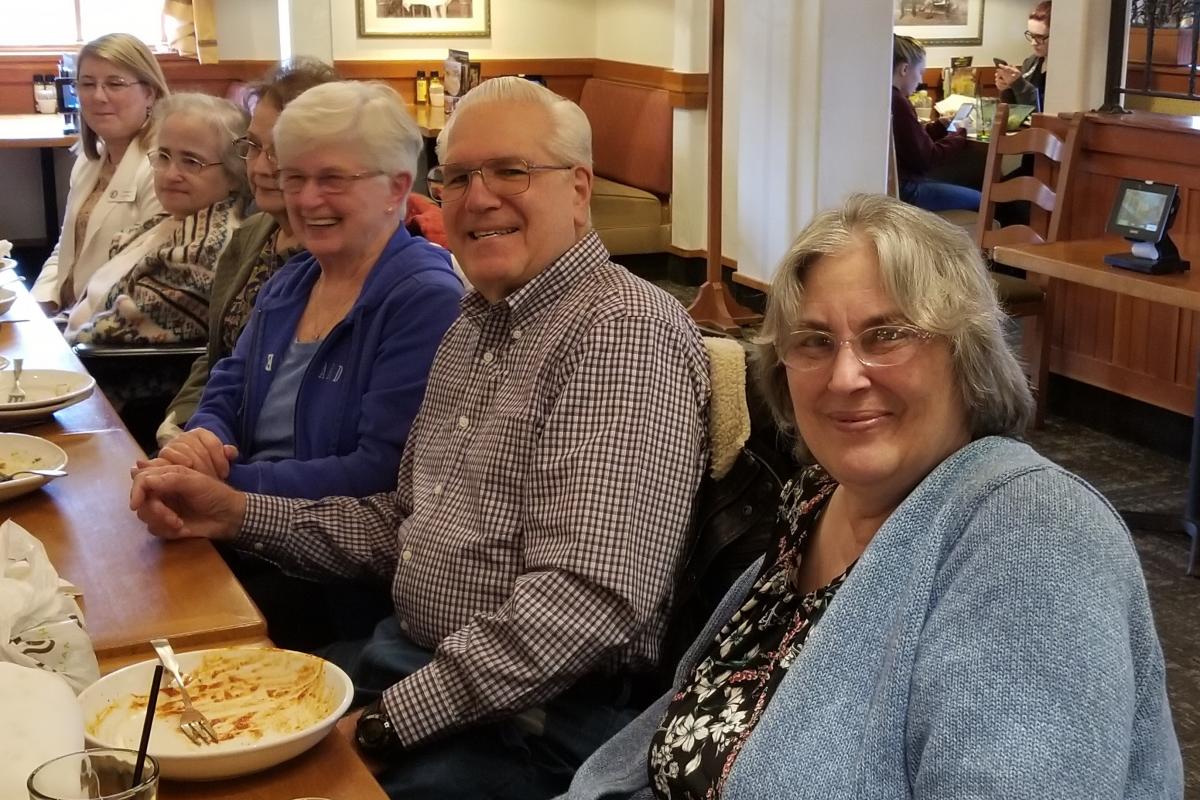 Seniors Seated at Table in Olive Garden 1